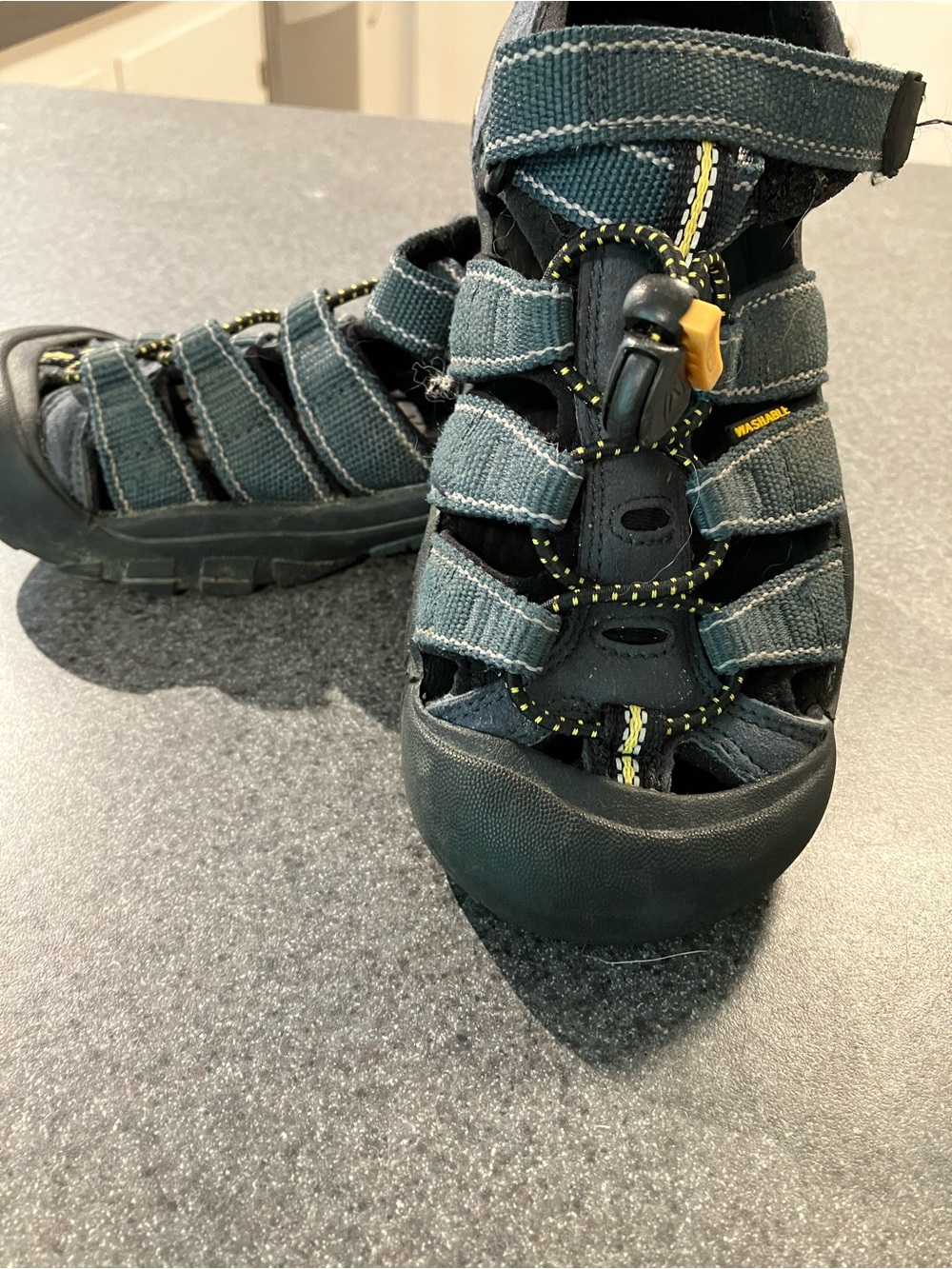 Keen Kids Closed-Toe Sandals in Black with Yellow Accent